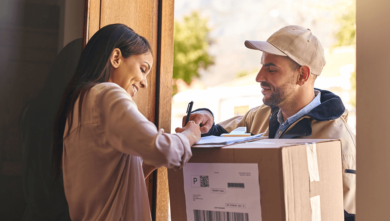 Customer accepting a package at her doorstep