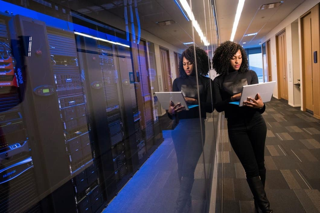 Engineer managing edge infrastructure in a server room